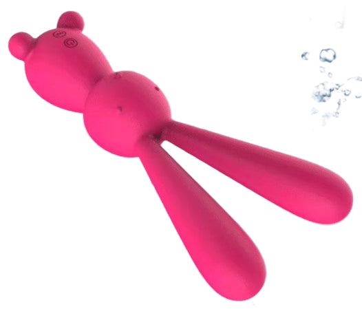 Pink silicone toy with IPX7 waterproof label in a bathroom setting