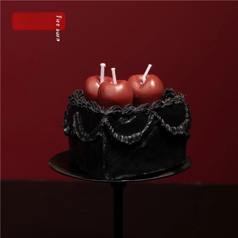 Cozy lifestyle scene featuring a Black Forest cake scented candle