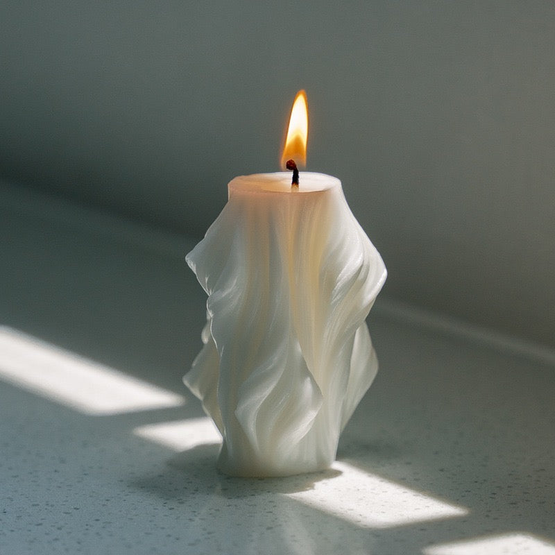 Decorative wave diamond column candle featuring gentle heat and soft glow