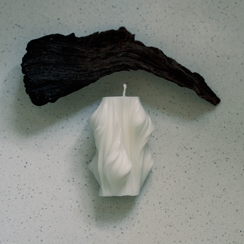 Wave diamond column candle with sculpted and elegant design